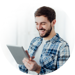 Image of a happy young man happy about finding affordable dental care and dentist that accept Lincoln Dental Plans in Lincoln, NE.