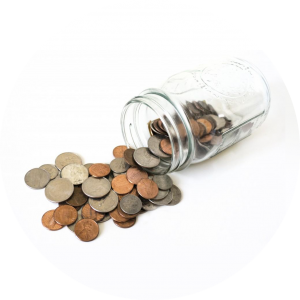 Picture of a jar of coins that has been spilled. This shows the savings you receive when you seek affordable dental care through Lincoln Dental Plans.