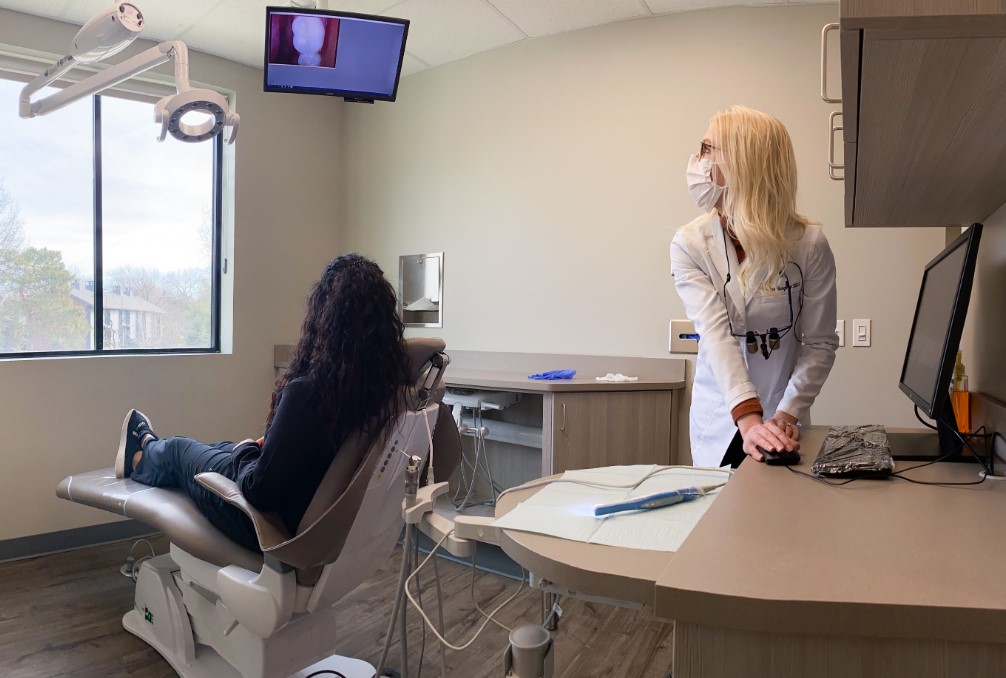 Dr. Christine Bergman from South Lincoln Family Dentistry with a patient. Our dentists at Nebraska Family Dentistry offer gentle, non-judgmental dentistry in a relxing environment.,